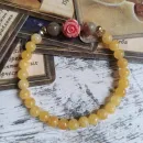 Браслет из кальцита с турмалином и кораллом