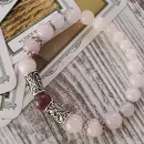 Браслет из розового кварца с рунами и турмалином