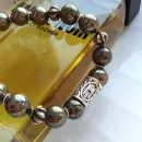 Мужской браслет из пирита и руны "Эваз".