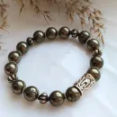 Мужской браслет из пирита и руны "Эваз".