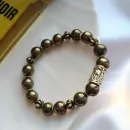 Мужской браслет из пирита и руны "Эваз".