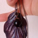 Колье "лист дёрена" с бусиной чёрного агата и хрустальной бусиной