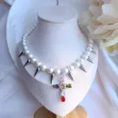 Колье жемчужное с шипами и крестиком