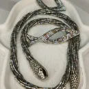 Жгут "Стильная змейка" и серьги листики ручной работы.