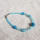 Браслеты из бисера с бусинами и кристаллами