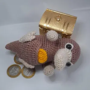 Вязаная игрушка Нюхлер