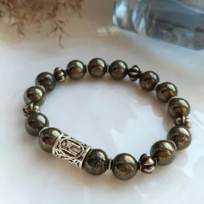 Мужской браслет из пирита и руны "Эваз".