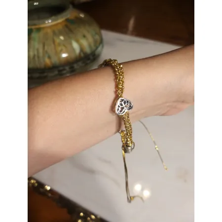 Браслет из золотого шнура с металлическими бусинами