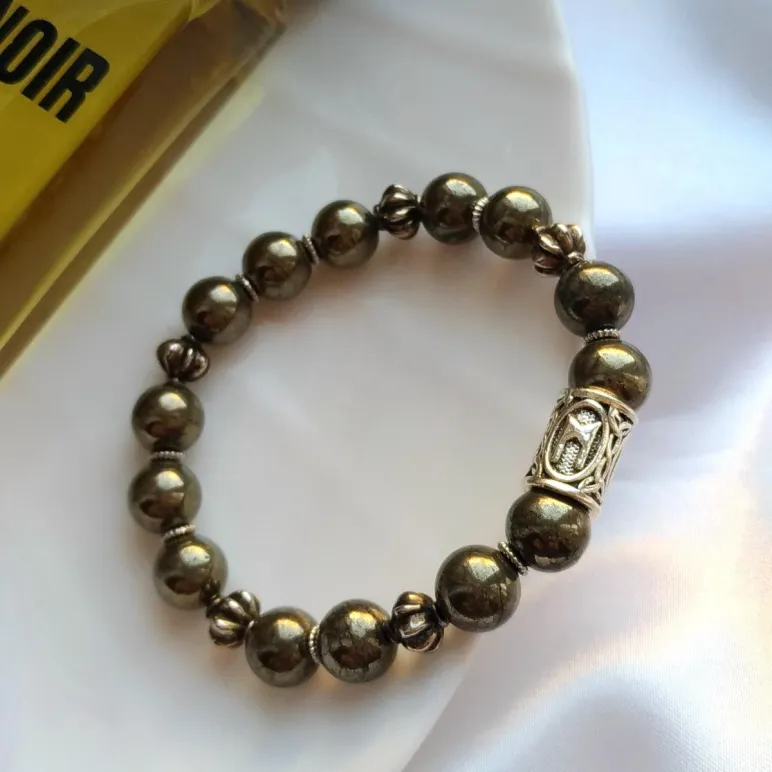 Мужской браслет из пирита и руны "Эваз".