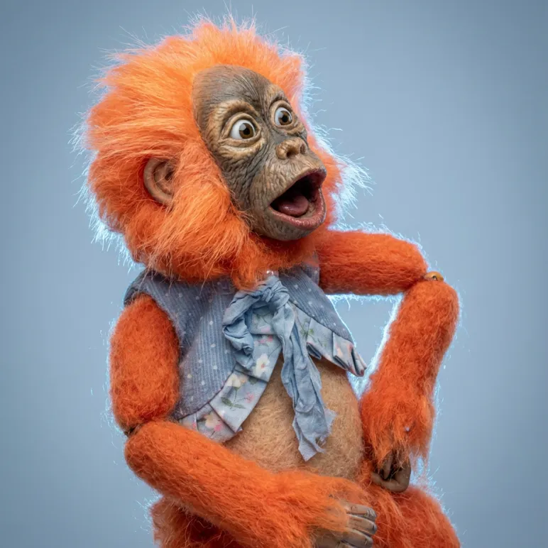 Оранжевая обезьянка