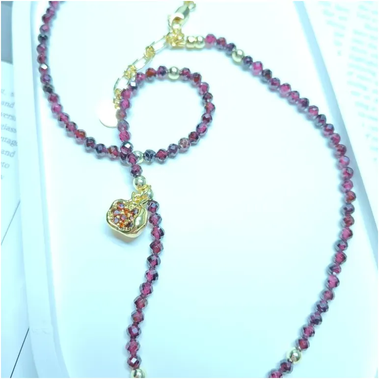 Комплект: бусы из натурального граненого граната и подвески с гранатом под золото, серьги с гранатом