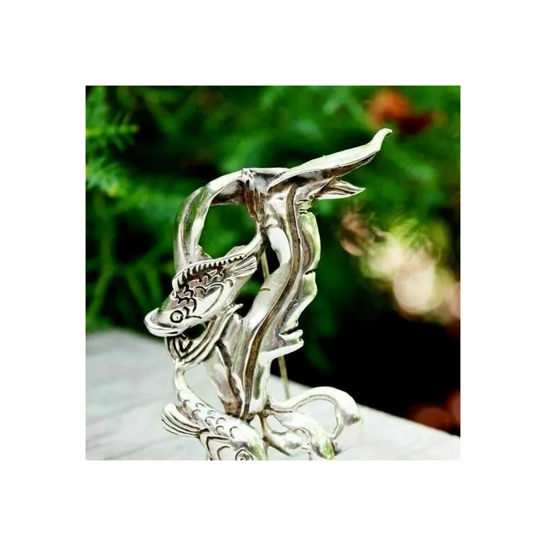 Винтажная серебряная брошь от CYVRA