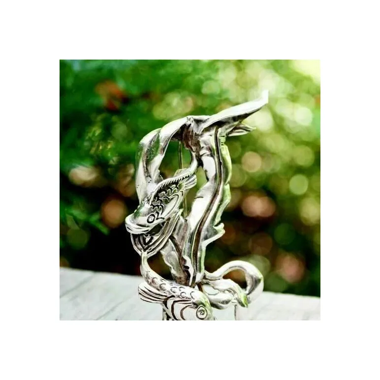 Винтажная серебряная брошь от CYVRA