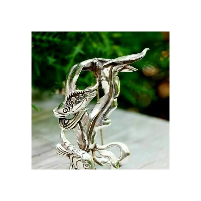 Винтажная серебряная брошь от CYVRA