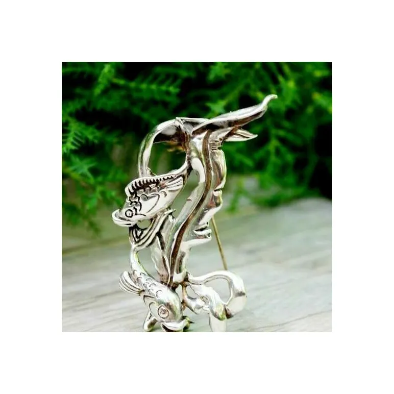 Винтажная серебряная брошь от CYVRA